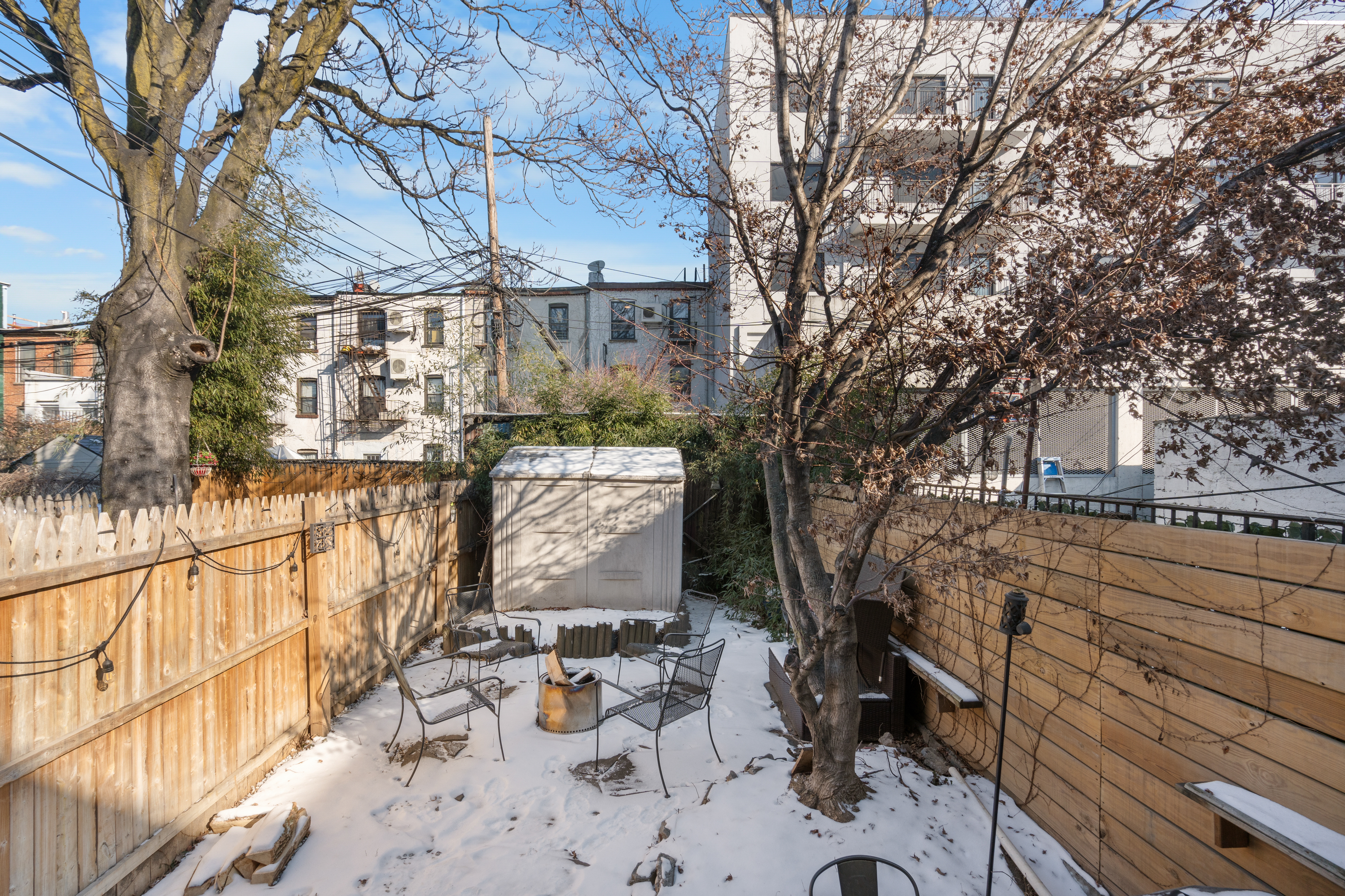 87 16th Street Brooklyn, NY 11215 - Photo 8 of 8 a view of a yard with a tree