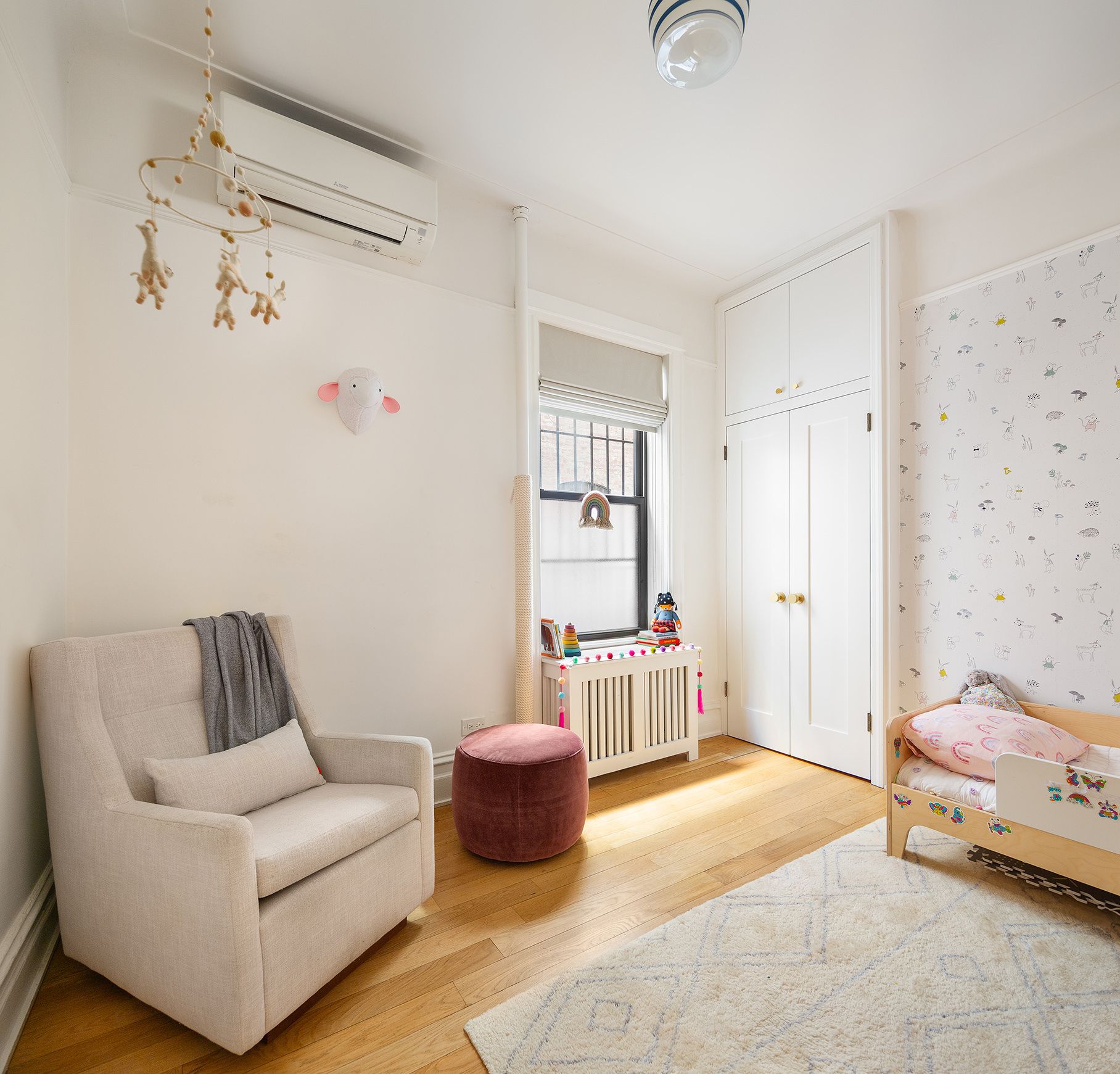 567 8th Street, Unit 2 Brooklyn, NY 11215 - Photo 6 of 9 a living room with furniture and a rug