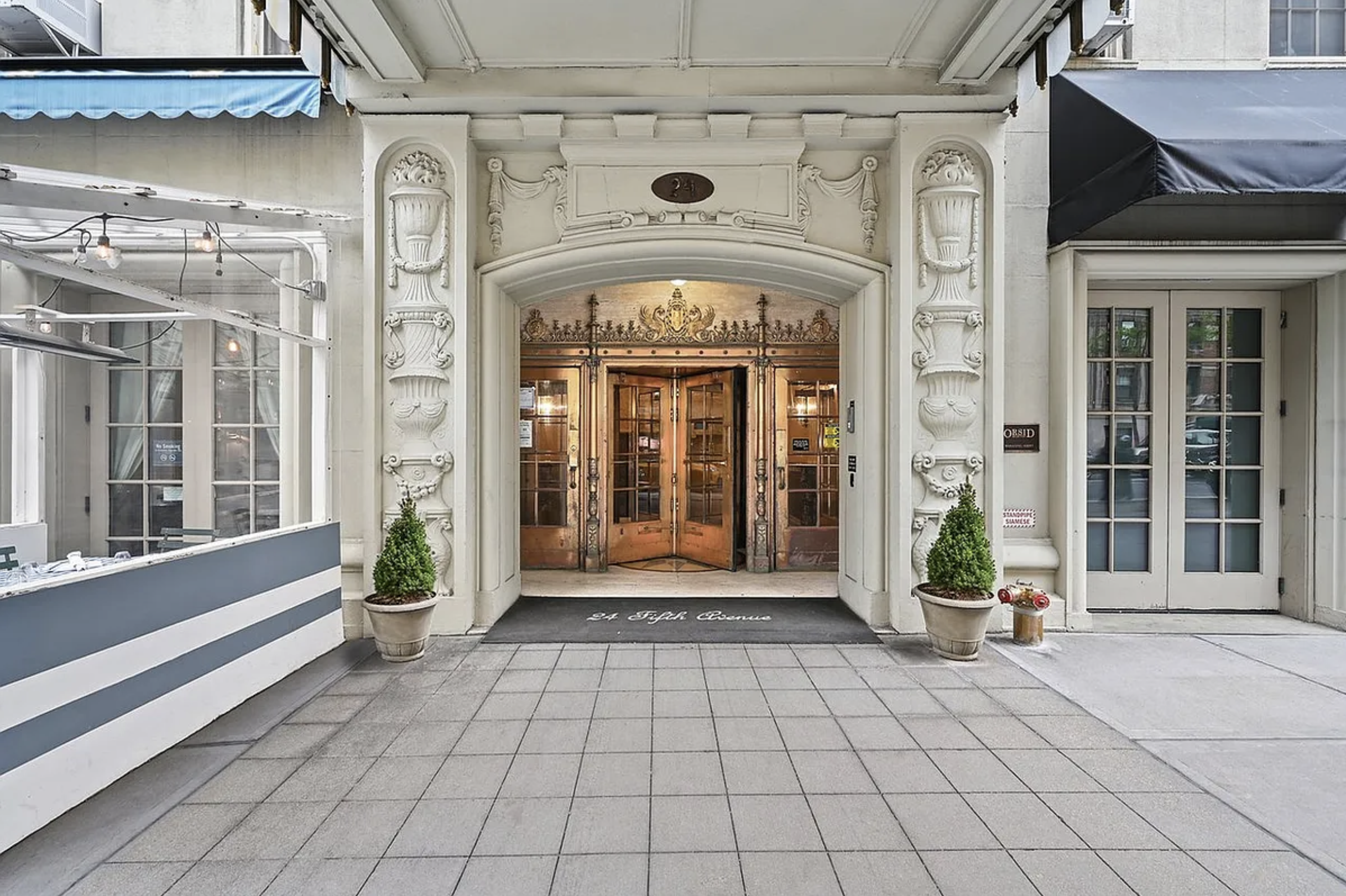 24 5th Avenue, Unit 1212 Manhattan, NY 10011 - Photo 5 of 9 a view of an entrance door of the building