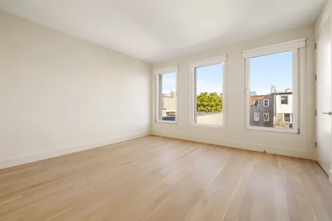 an empty room with windows