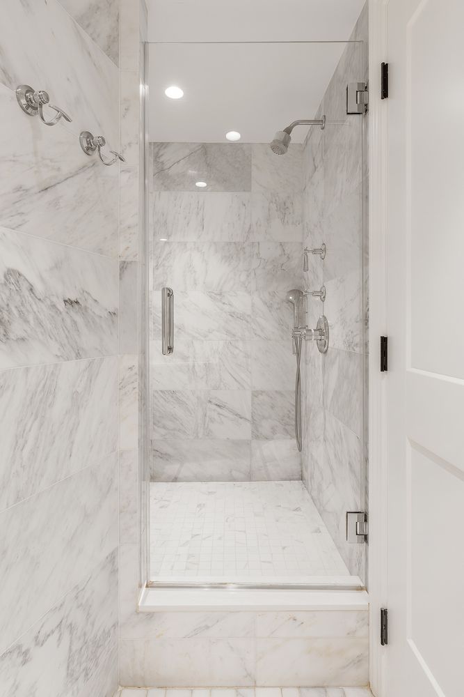 303 Greenwich Street, Unit 8DE Manhattan, NY 10013 - Photo 11 of 20 a bathroom with a shower
