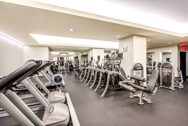 20 Pine Street, Unit 2905 Manhattan, NY 10005 - Photo 9 of 14 a view of a room with gym equipment