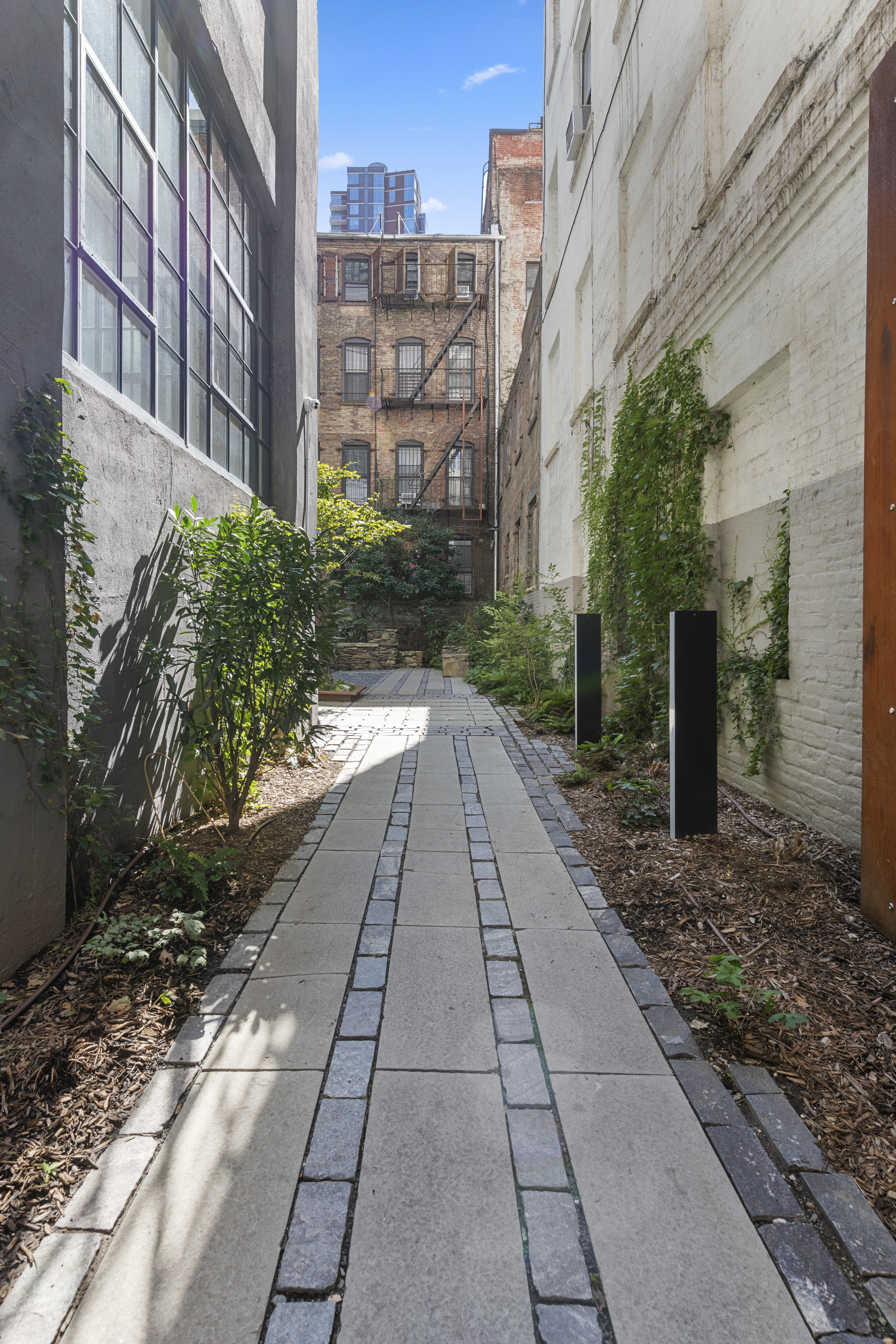 168 Plymouth Street, Unit 5A Brooklyn, NY 11201 - Photo 18 of 19 a view of a pathway with a yard