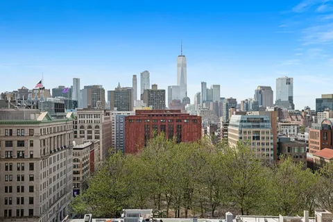 a view of a city with tall buildings