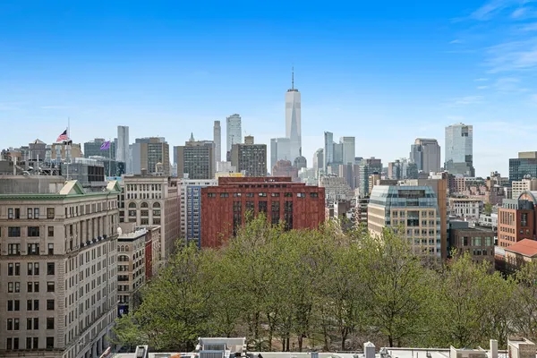 a view of a city with tall buildings