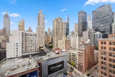 a view of city with tall buildings