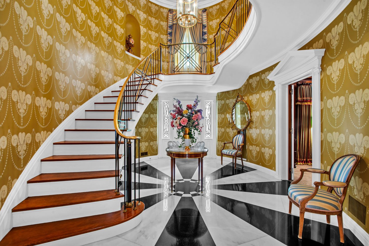 a view of entryway with furniture and rug