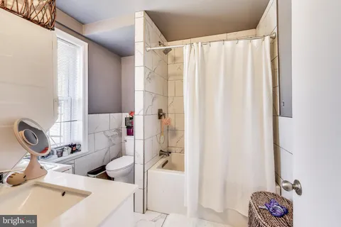 a bathroom with a sink and a tub