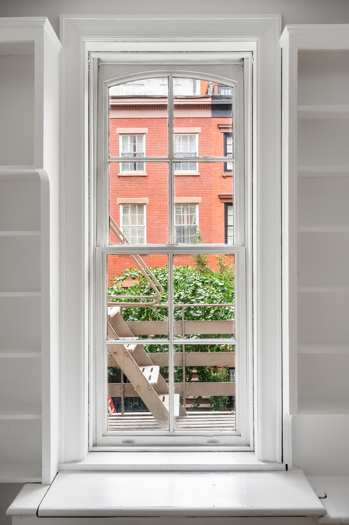 29 Perry Street, Unit 2F Manhattan, NY 10014 - Photo 14 of 17 a view of a glass door with a glass door