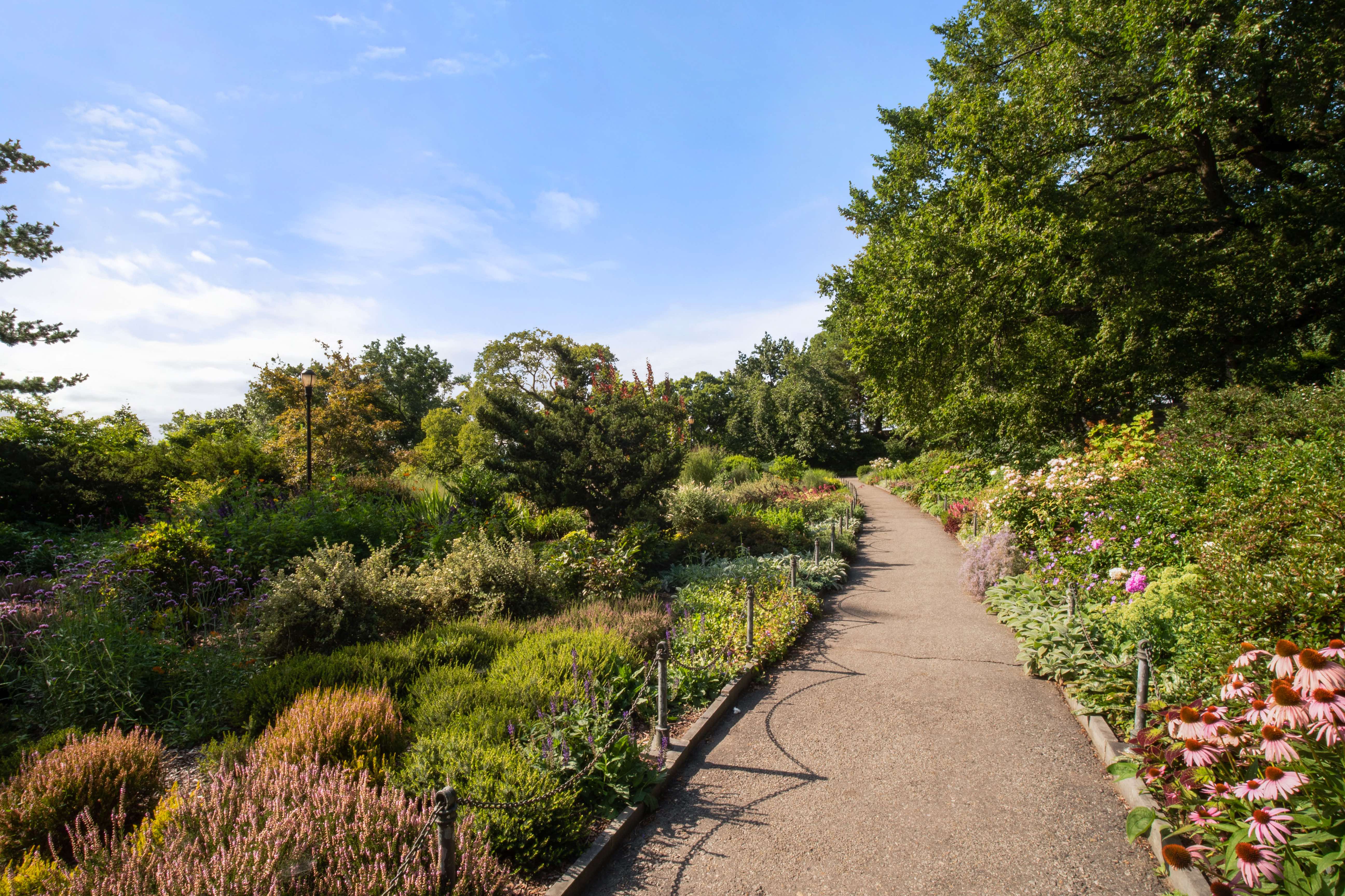 720 Fort Washington Avenue, Unit 5D Manhattan, NY 10040 - Photo 16 of 17 a backyard of a house with a yard and outdoor seating