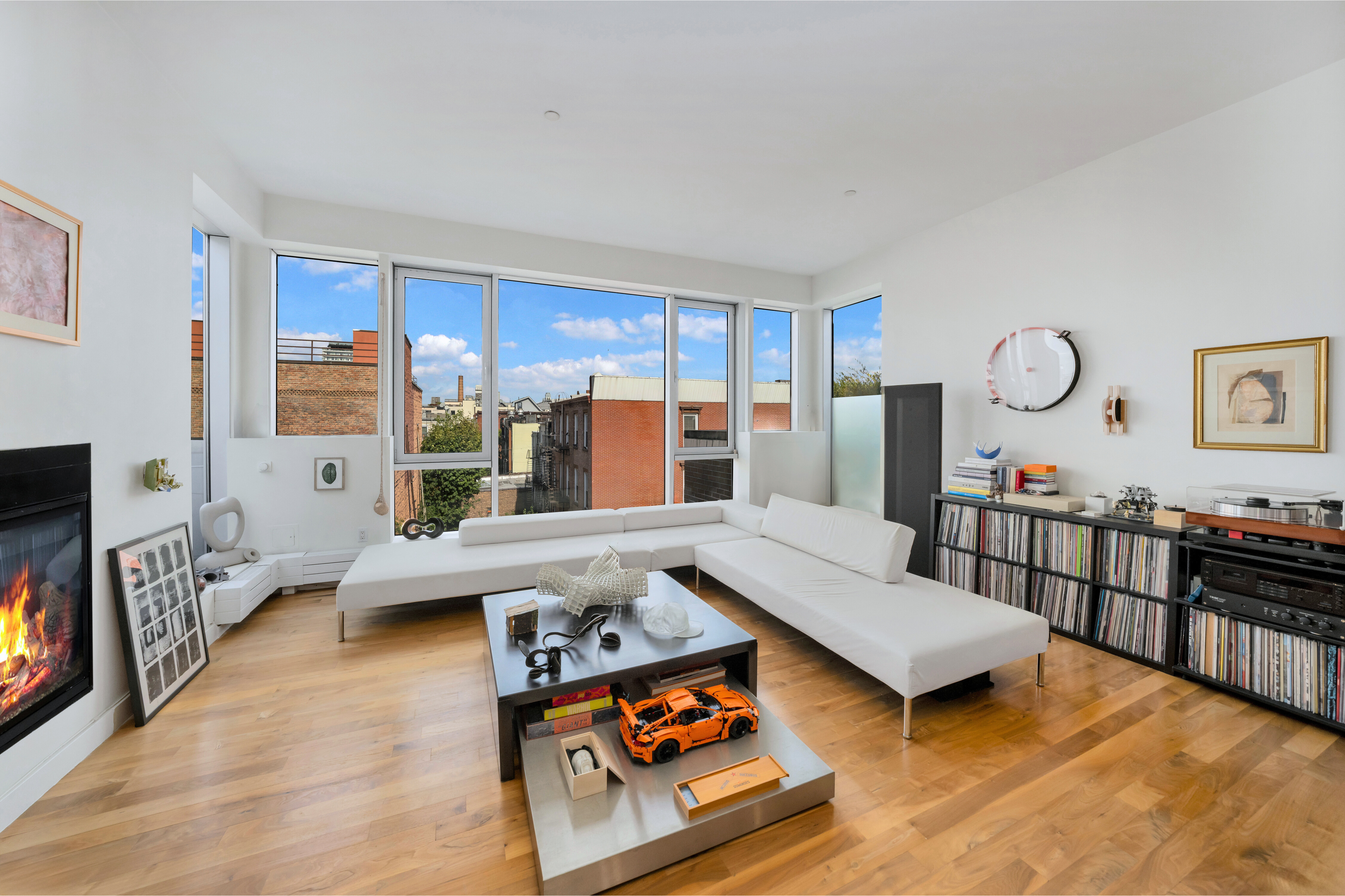120 North 7th Street, Unit PH4B Brooklyn, NY 11249 - Photo 2 of 13 a living room with furniture and a large window