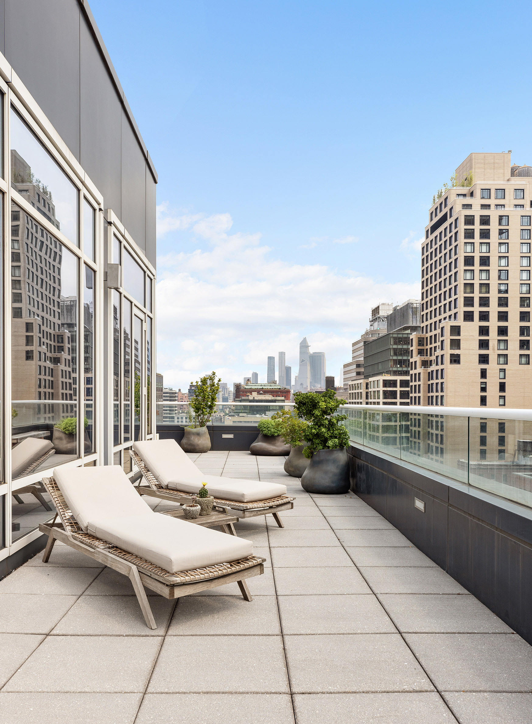 330 Spring Street, Unit PH Manhattan, NY 10013 - Photo 12 of 23 a terrace with seating space and city view