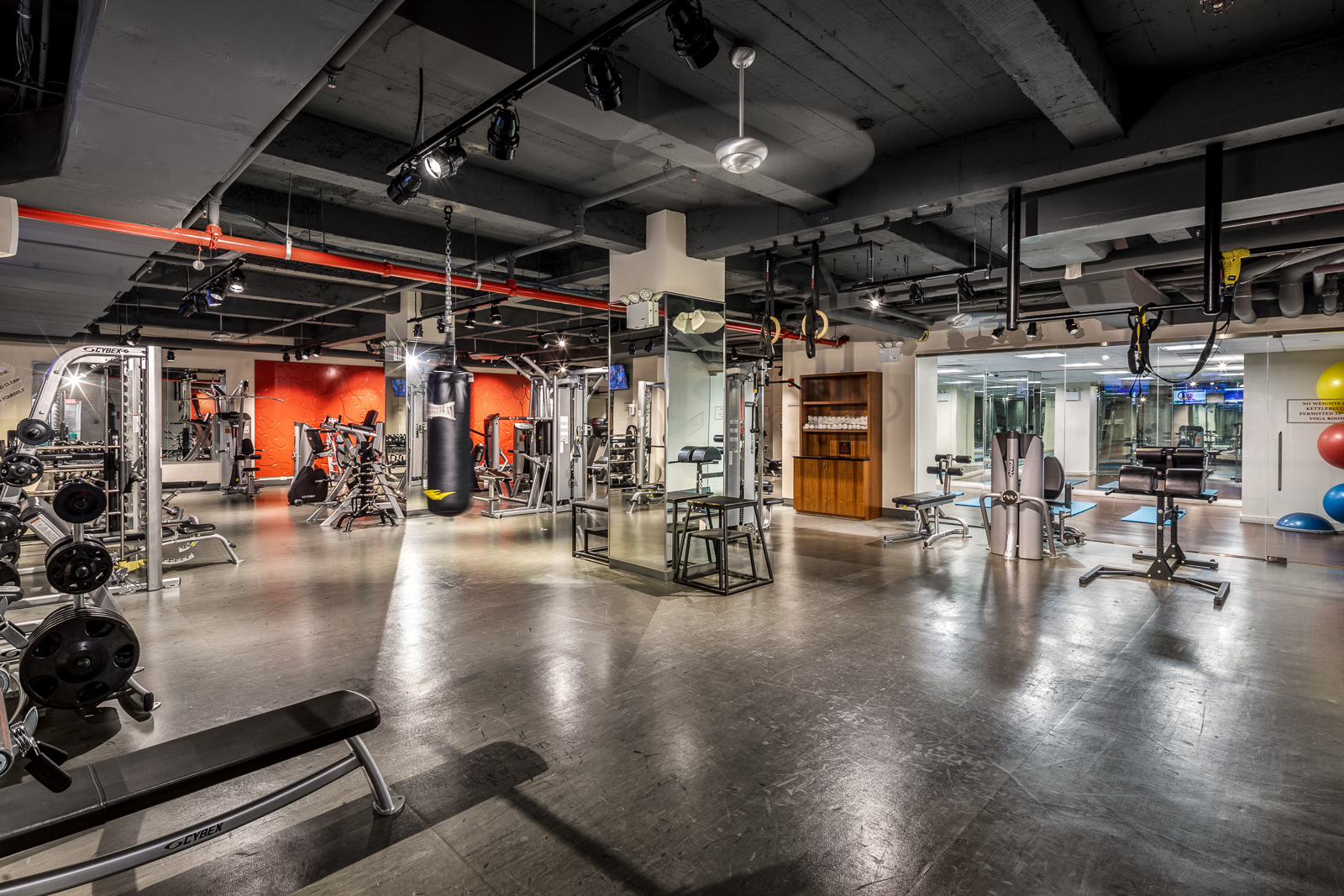 88 Greenwich Street, Unit 501 Manhattan, NY 10006 - Photo 8 of 15 a view of a room with gym equipment