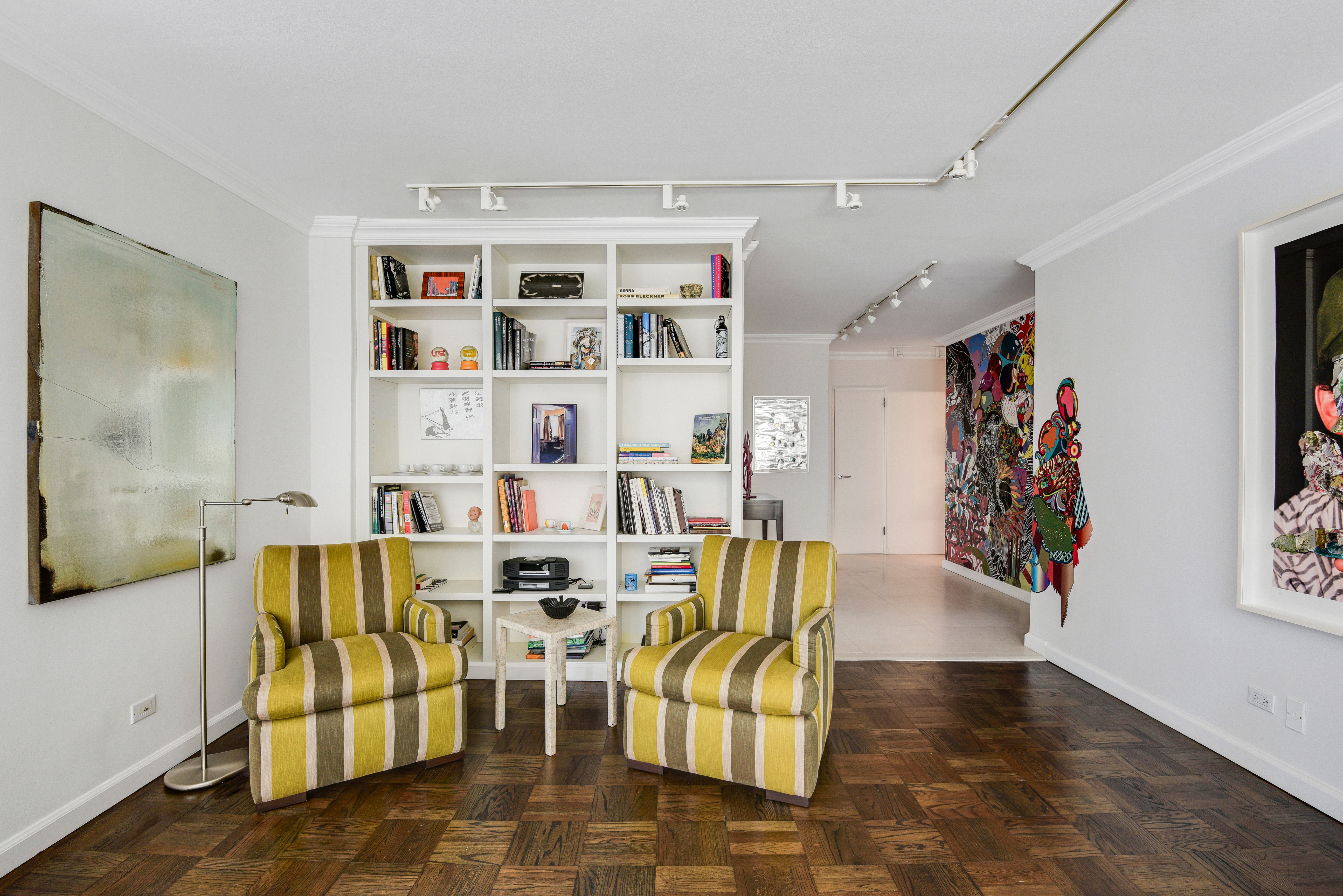 200 Central Park South, Unit 19J Manhattan, NY 10019 - Photo 8 of 12 a living room with furniture kitchen view and a window