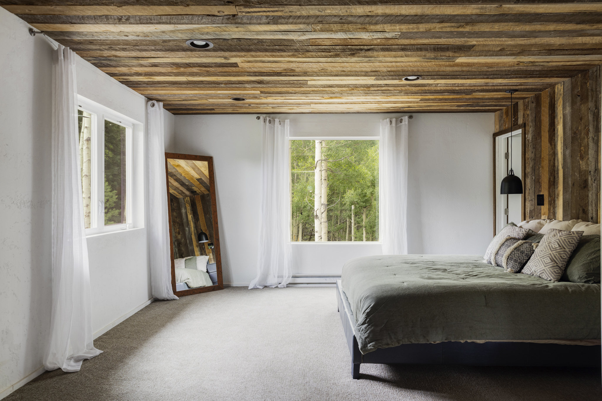 133 Gold Run Road Alma, CO 80420 - Photo 17 of 46 a bedroom with a bed and a large window