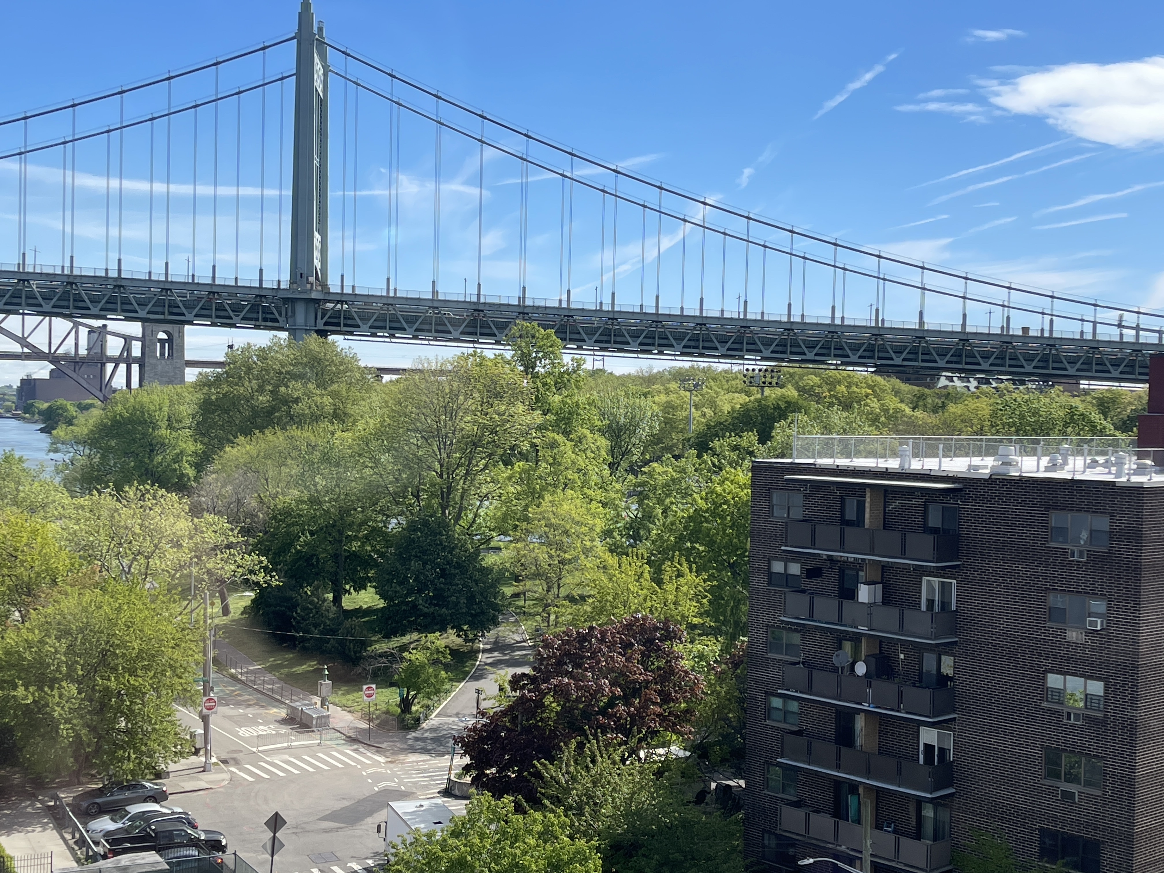 25-40 Shore Boulevard, Unit 15S Queens, NY 11102 - Photo 20 of 21 a view of a back yard of the house and a lots of flower plants