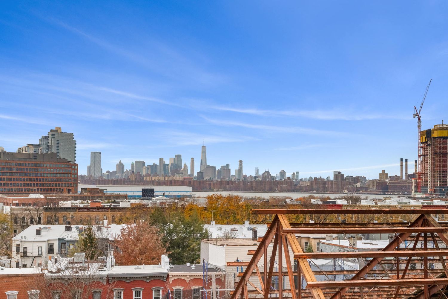 717 Manhattan Avenue, Unit 2A Brooklyn, NY 11222 - Photo 14 of 17 a view of a city with tall buildings