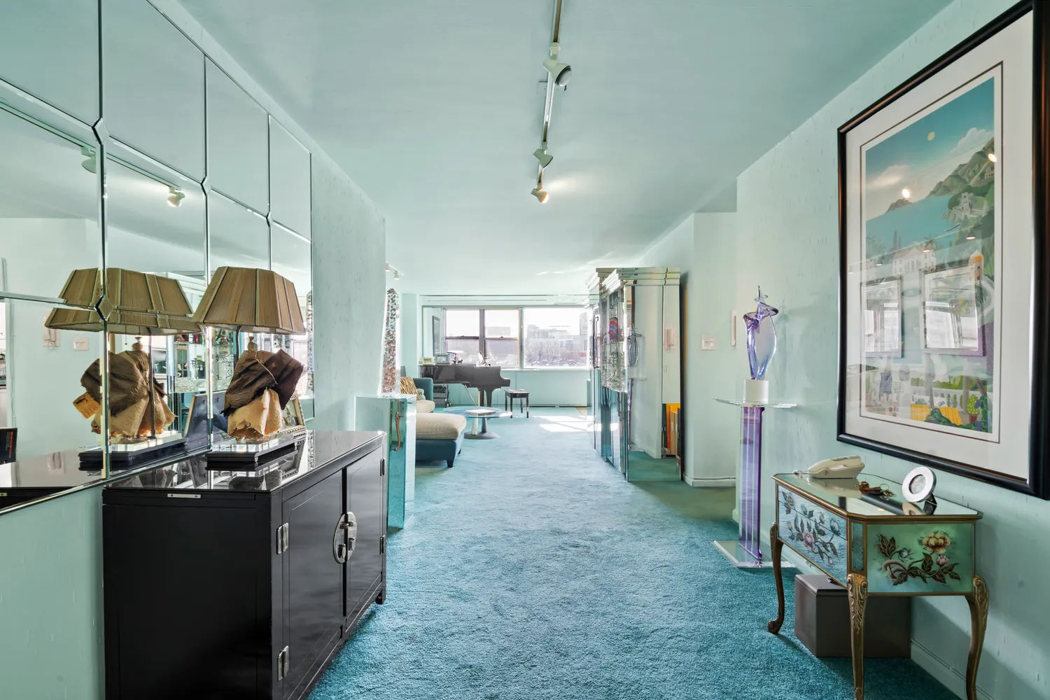 a living room with furniture and a window