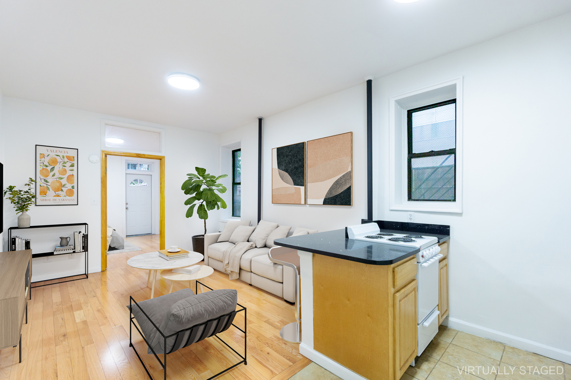 315 East 5th Street, Unit 1C Manhattan, NY 10003 - Photo 9 of 15 a living room with furniture and a wooden floor