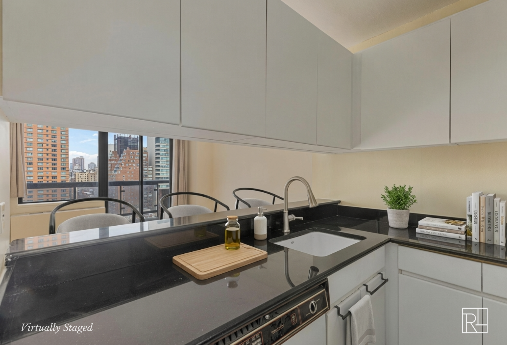 300 East 62nd Street, Unit 1501 Manhattan, NY 10065 - Photo 9 of 14 a kitchen with a sink and a stove top oven