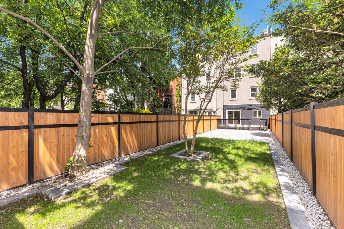 1050 Sterling Place Brooklyn, NY 11213 - Photo 13 of 23 a view of backyard with large trees