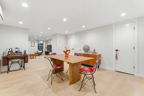 a very nice looking dining room with a table and chairs