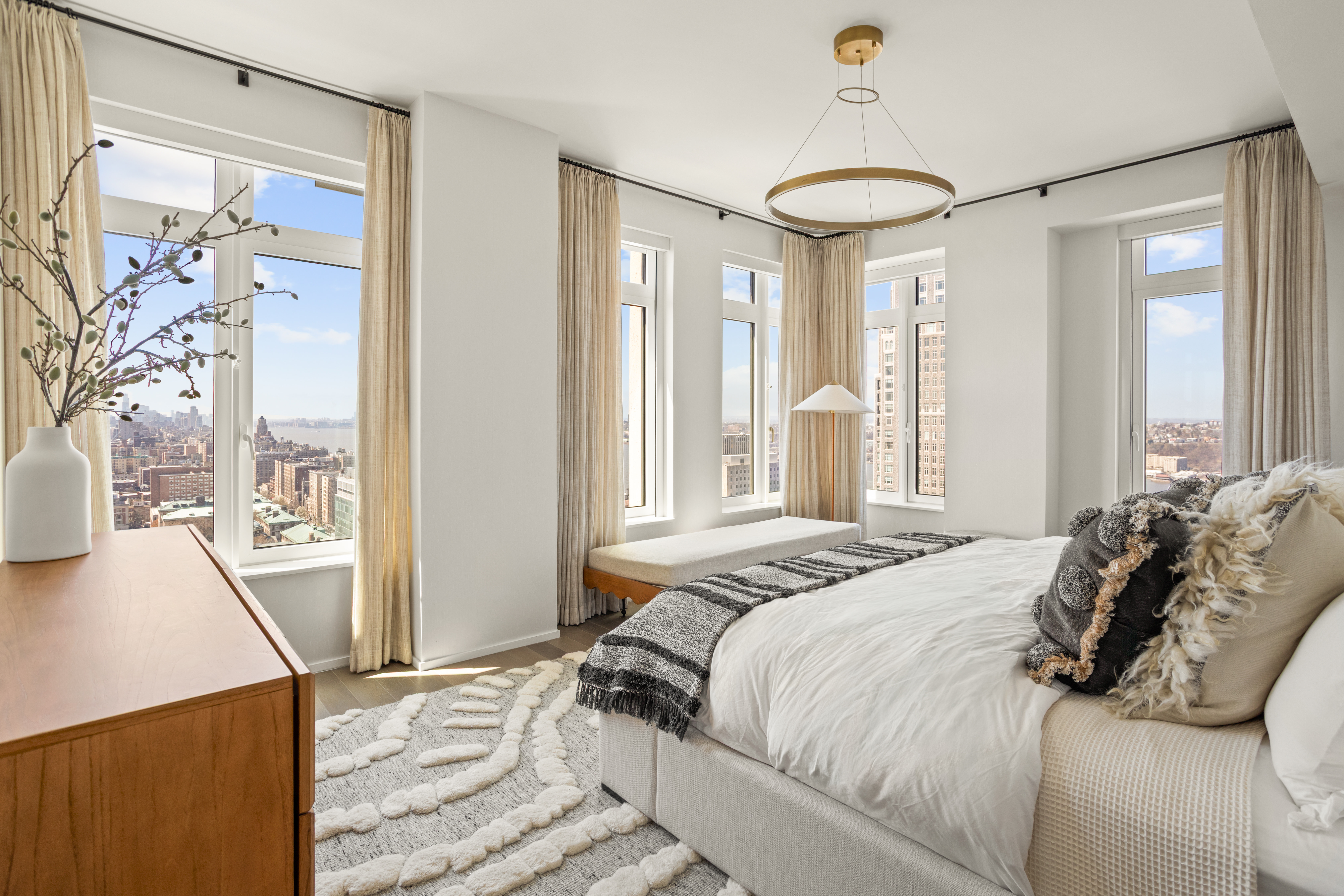 543 West 122nd Street, Unit PH31A Manhattan, NY 10027 - Photo 19 of 40 a bedroom with a large bed and a large window
