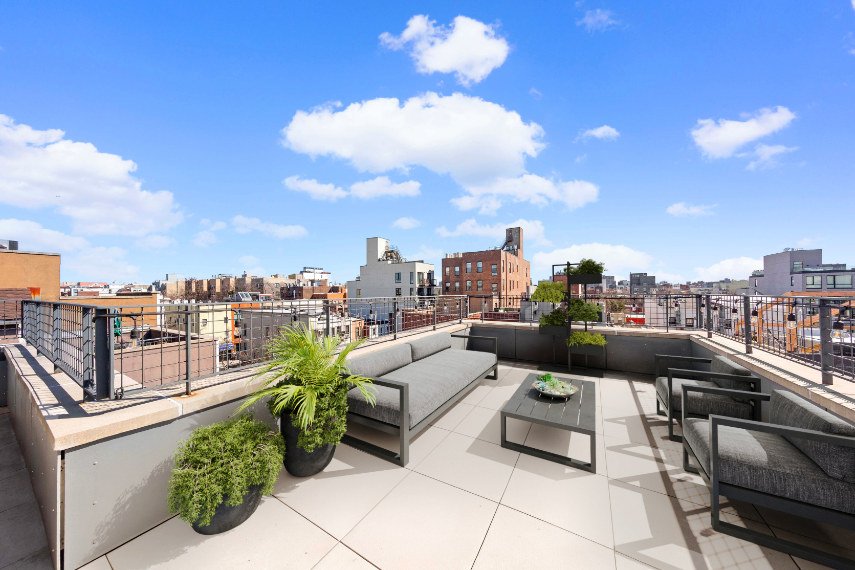 33 Conselyea Street, Unit PH Brooklyn, NY 11211 - Photo 13 of 16 a view of a terrace with couches and potted plants