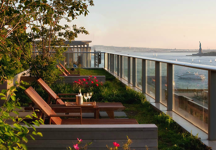 70 Little West Street, Unit 14B Manhattan, NY 10004 - Photo 16 of 17 a view of building with an outdoor space