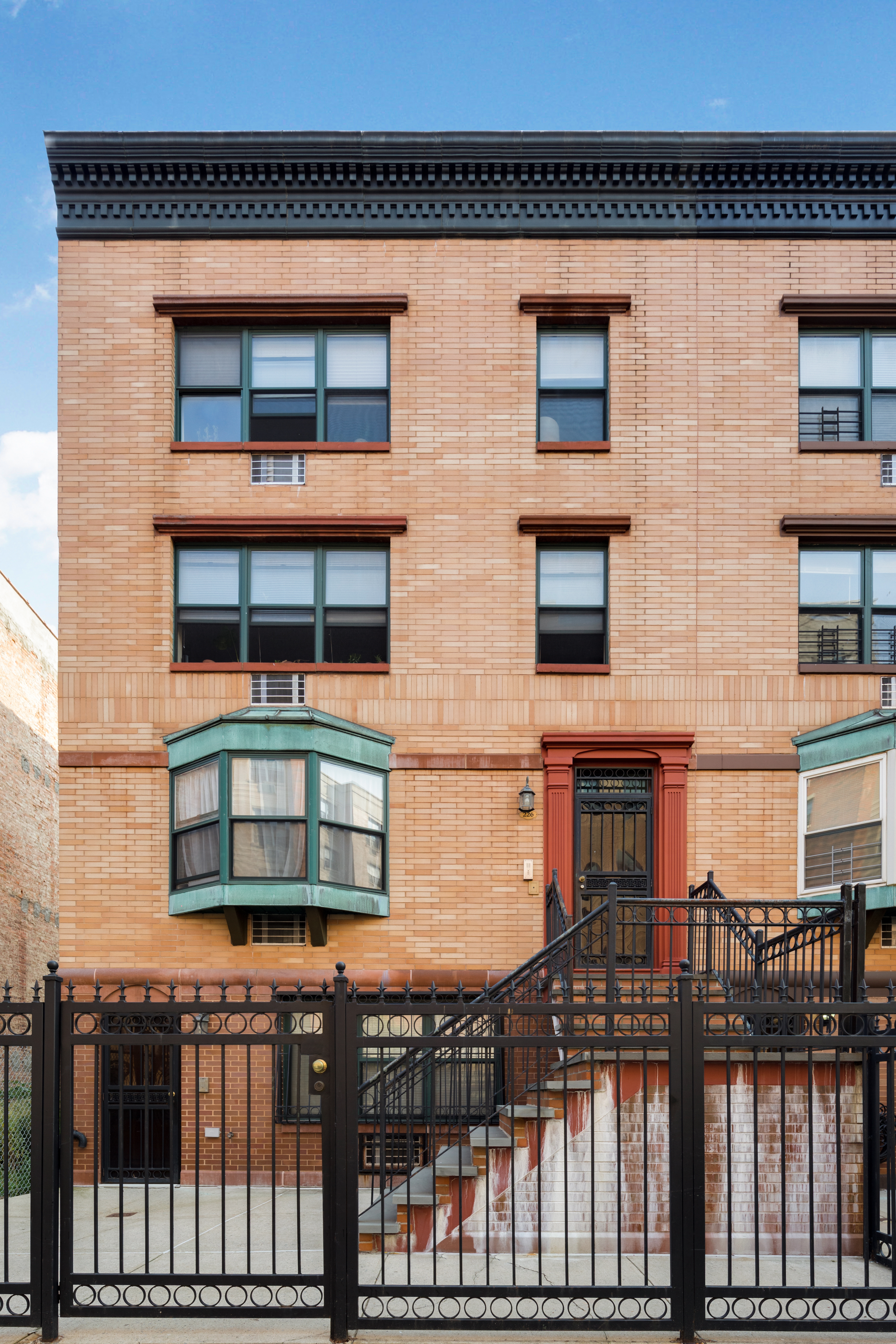 226 West 123rd Street, Unit 2 Manhattan, NY 10027 - Photo 6 of 9 a building with glass windows