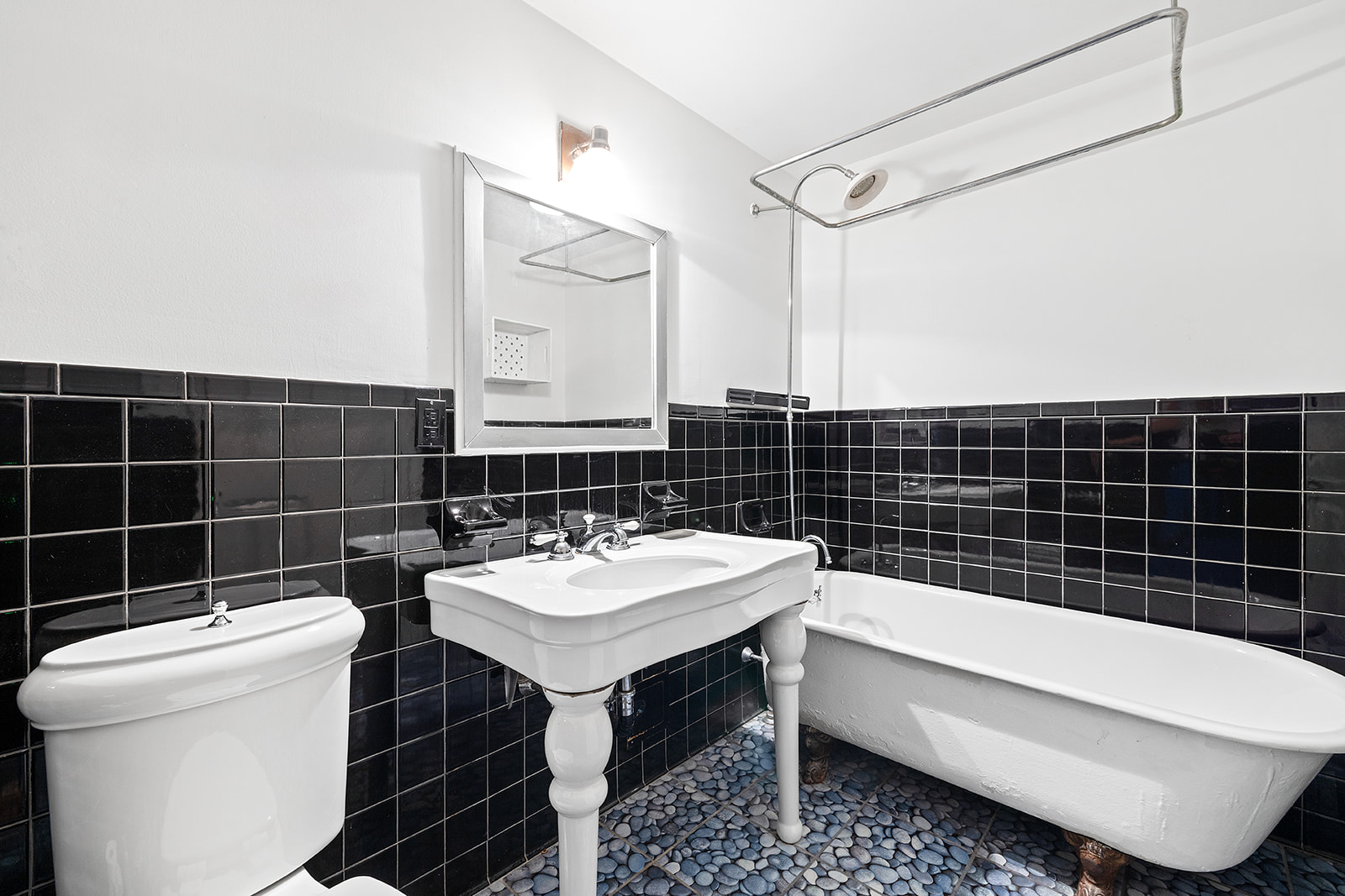 166 Congress Street, Unit A Brooklyn, NY 11201 - Photo 6 of 9 a bathroom with a sink toilet and shower