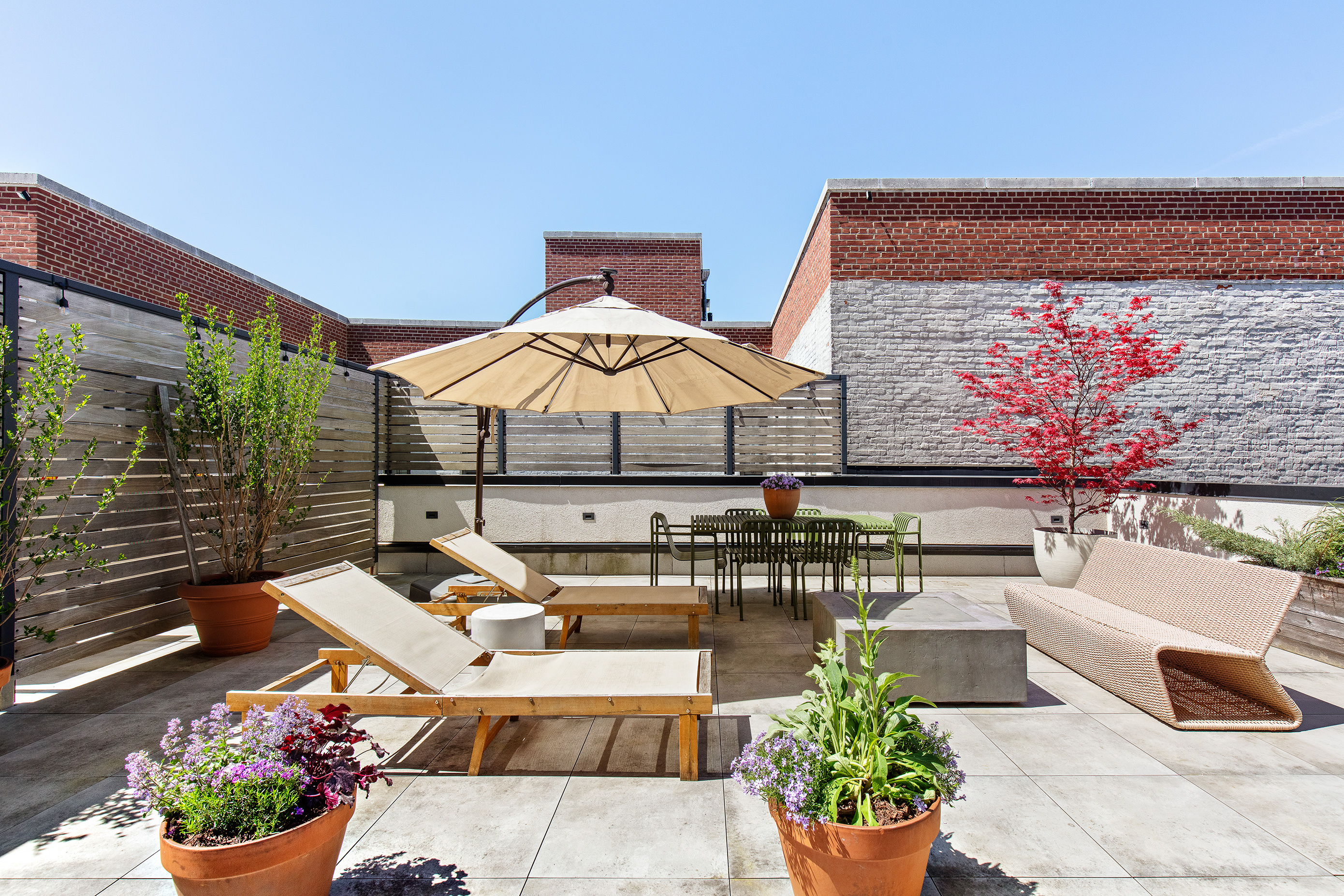 707 Willoughby Avenue, Unit 6B Brooklyn, NY 11206 - Photo 1 of 17 a outdoor space with patio the couches and a potted plant