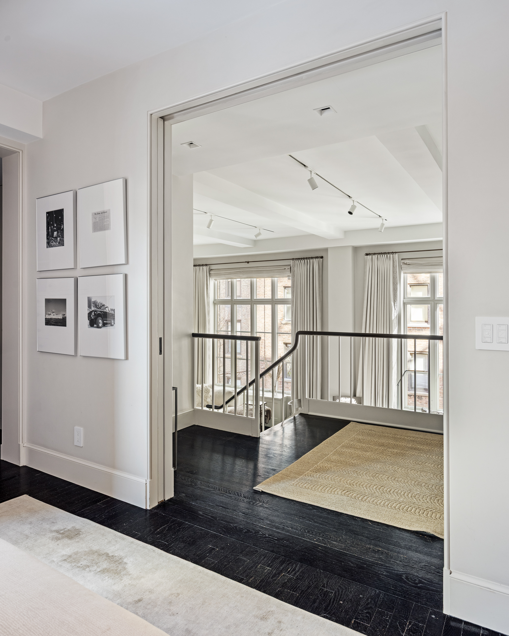 169 East 78th Street, Unit 7C Manhattan, NY 10075 - Photo 17 of 30 a view of an empty room with wooden floor and a window