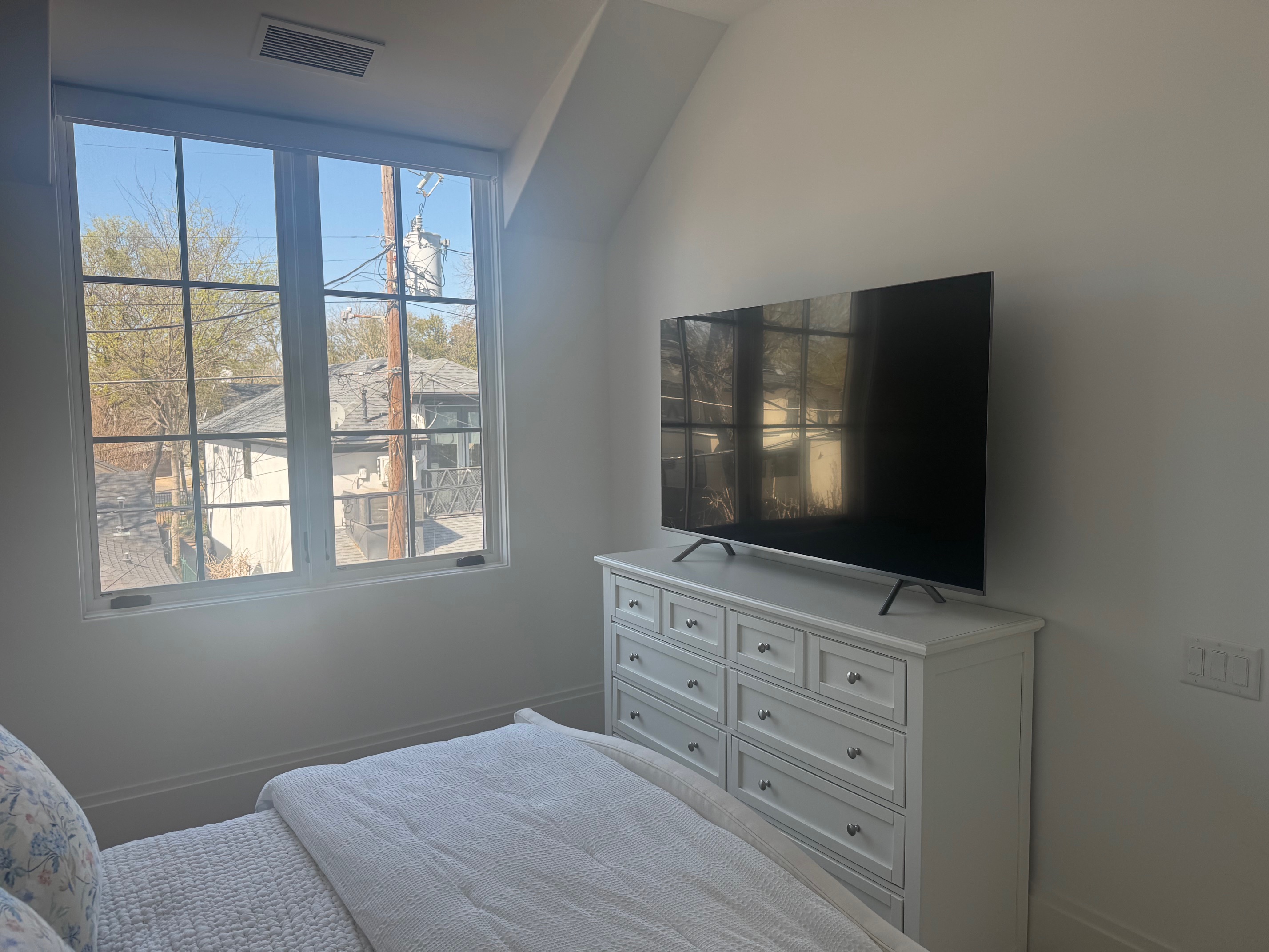 Address Upon Request Dallas, TX 75219 - Photo 6 of 12 a living room with furniture and a flat screen tv