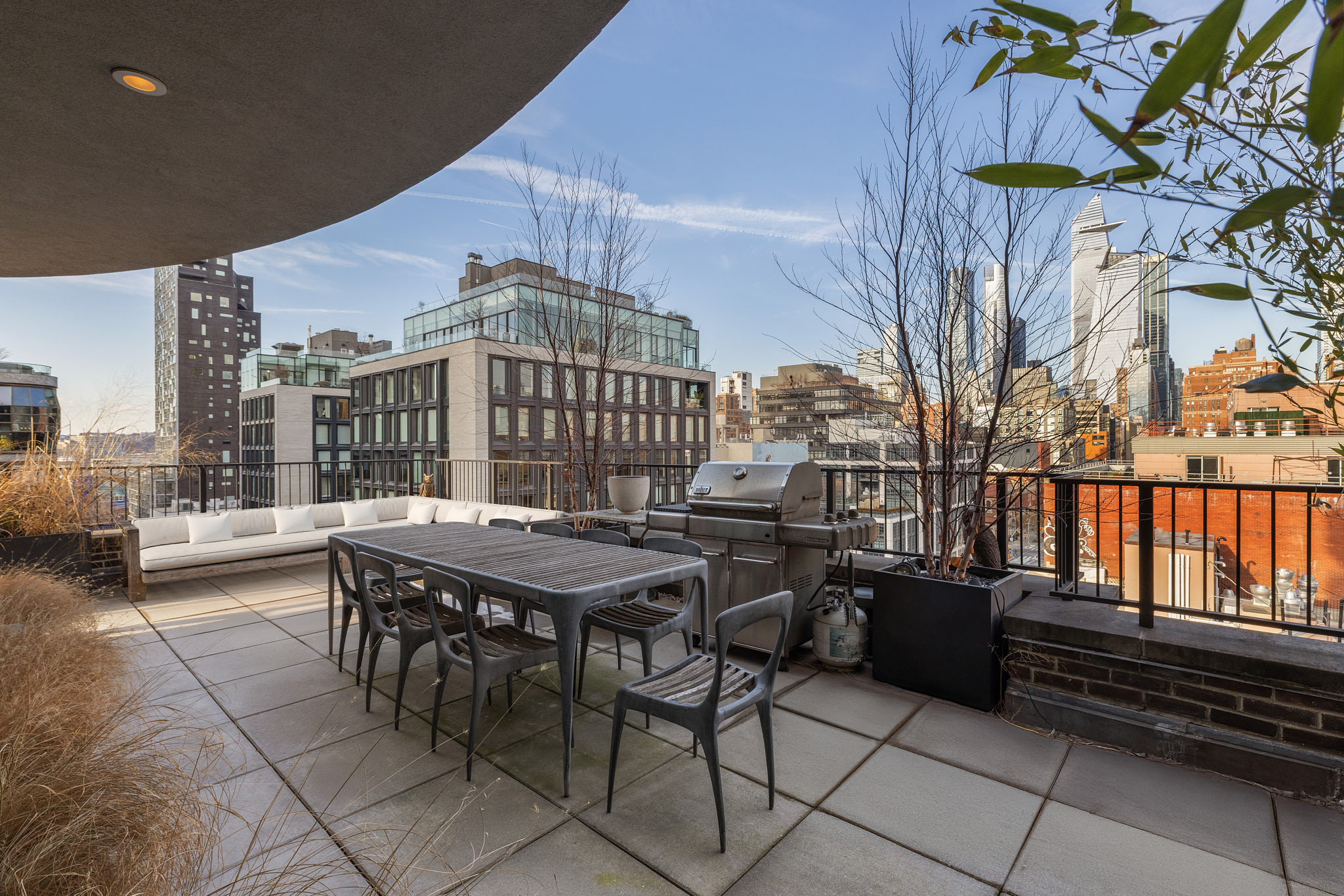 456 West 19th Street, Unit PHH Manhattan, NY 10011 - Photo 19 of 21 a view of a patio with a table and chairs