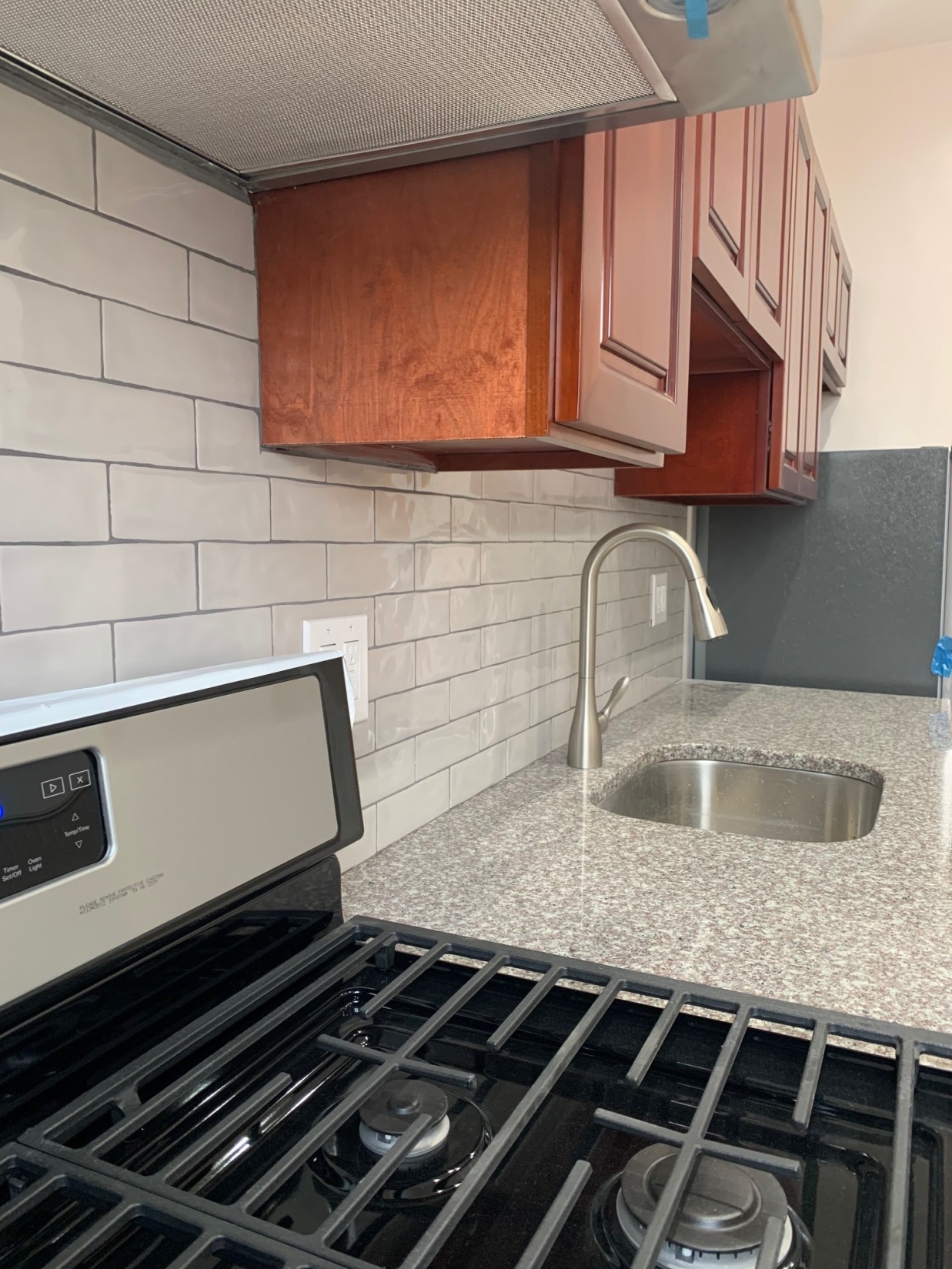 481 9th Street, Unit 4 Brooklyn, NY 11215 - Photo 24 of 33 a kitchen with granite countertop a stove and a sink