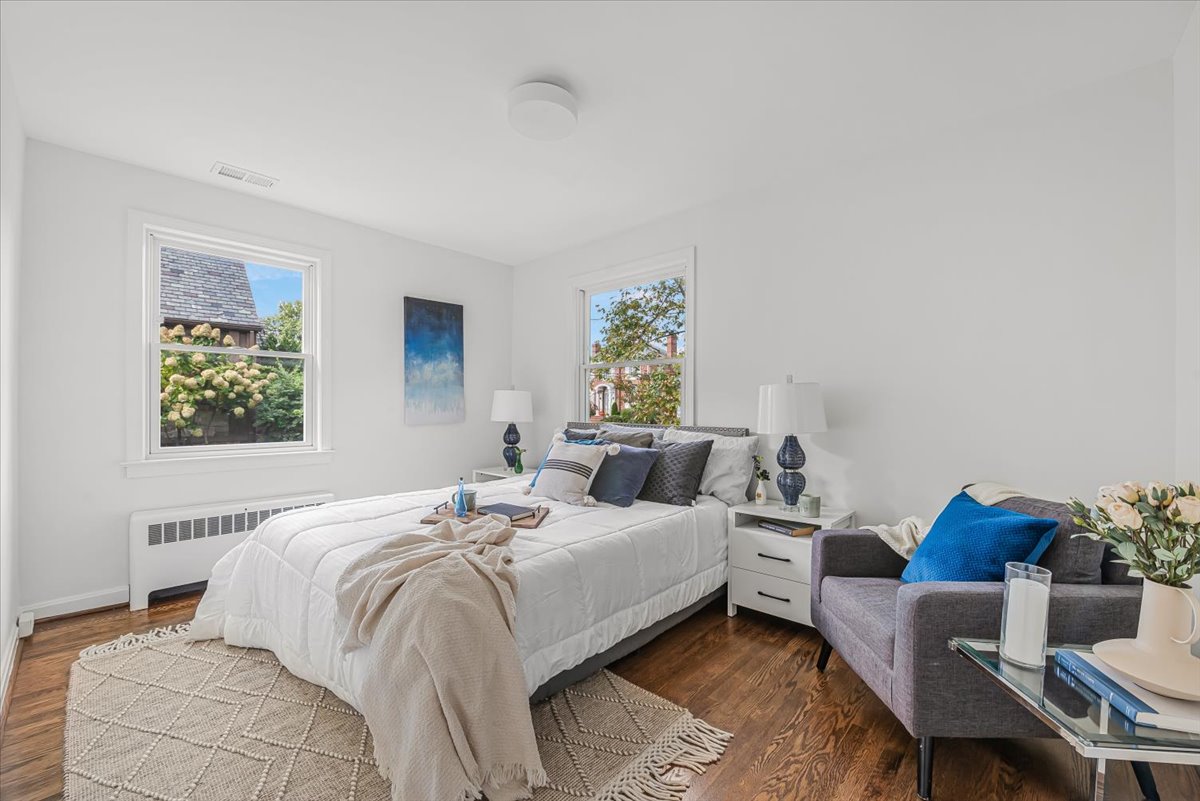 1902 Rookwood Road Silver Spring, MD 20910 - Photo 22 of 36 a bedroom with a bed and a couch