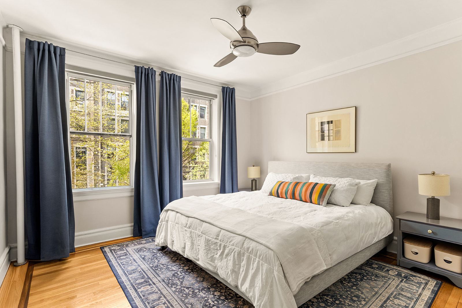 35-47 80th Street, Unit 21 Queens, NY 11372 - Photo 5 of 14 a bedroom with a large bed and a window