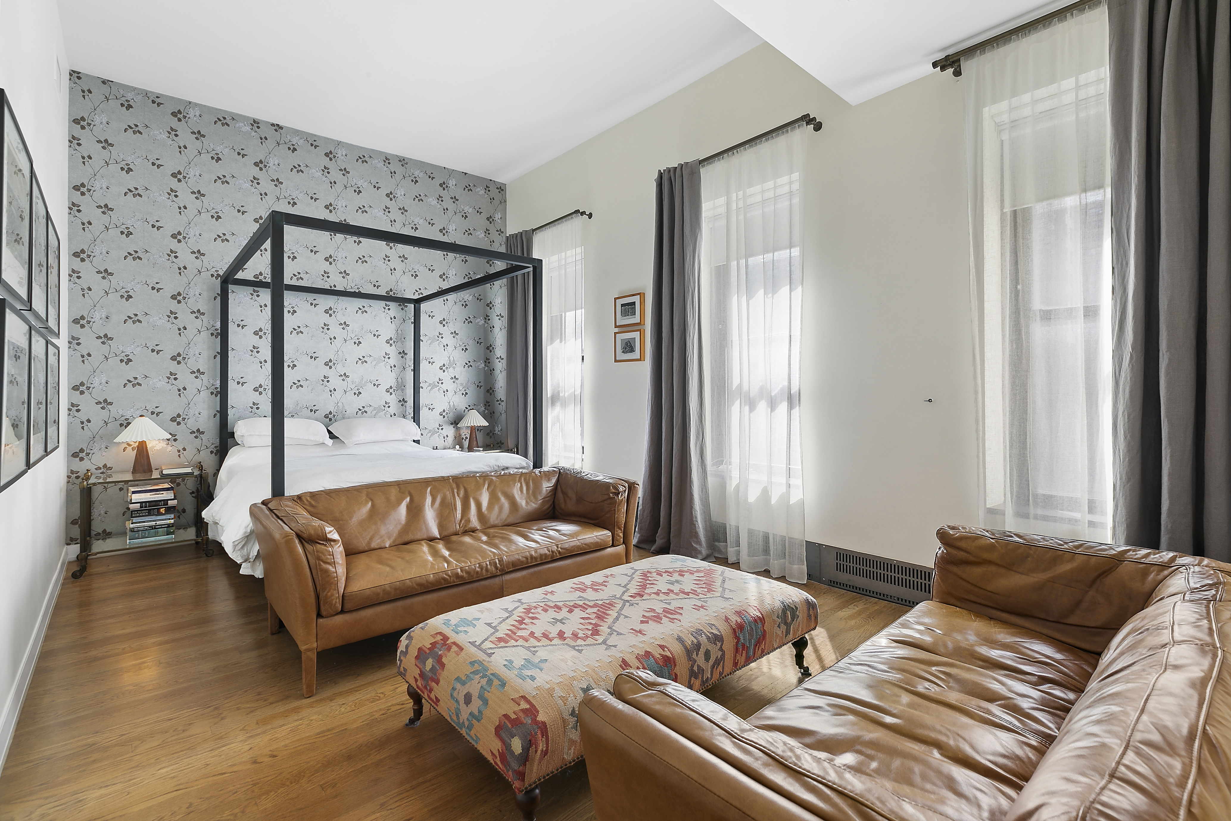 422 West 20th Street, Unit 5A Manhattan, NY 10011 - Photo 6 of 14 a bedroom with two beds and a couch