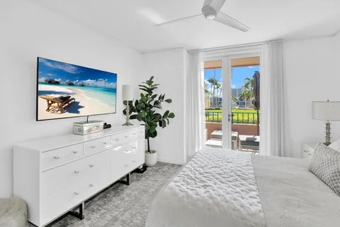 a bed room with furniture and window