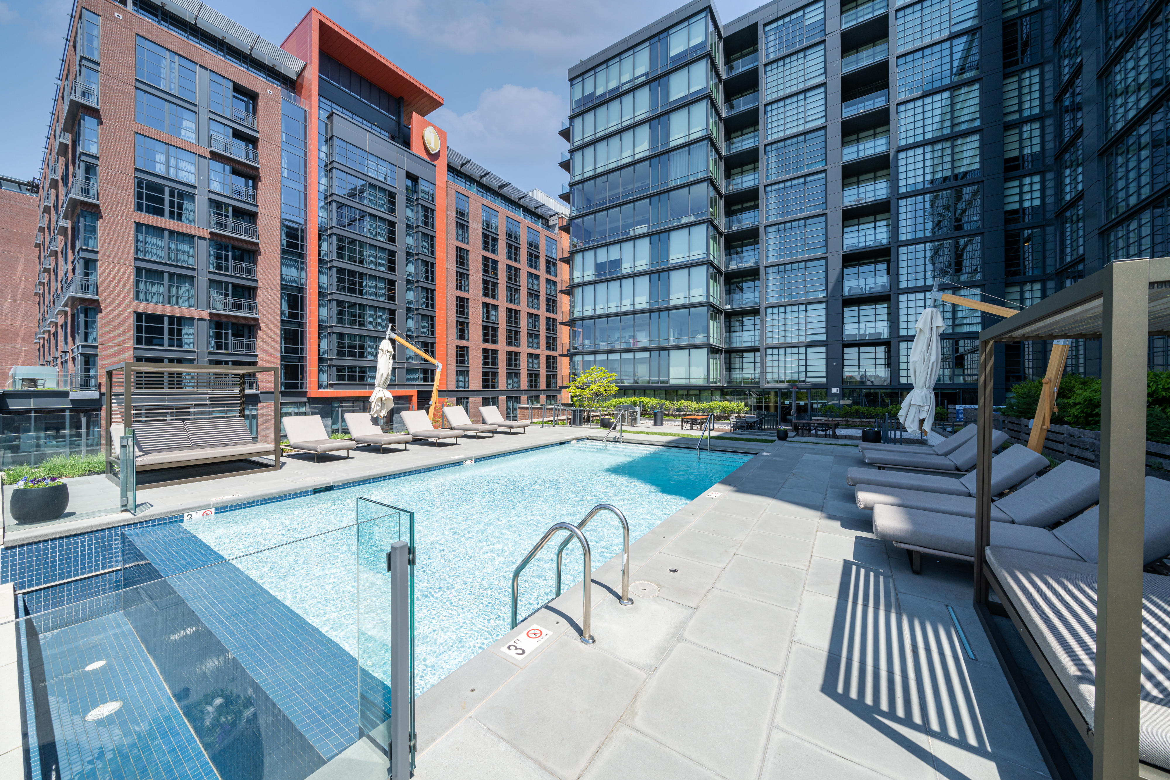 45 Sutton Square Southwest, Unit PH10 Washington, DC 20024 - Photo 32 of 44 a view of swimming pool with outdoor seating