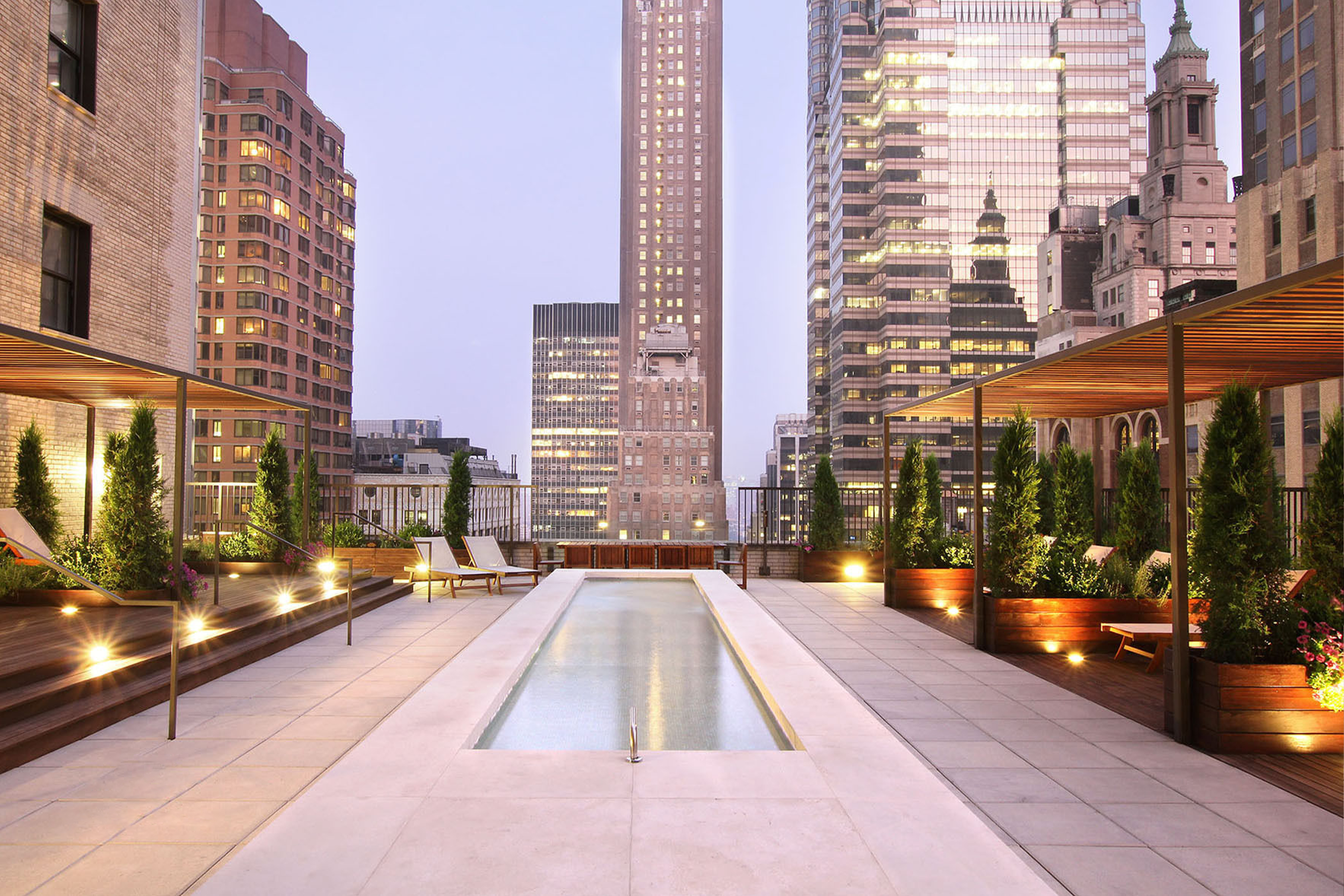 20 Pine Street, Unit 2012 Manhattan, NY 10005 - Photo 23 of 25 a view of a city with tall buildings