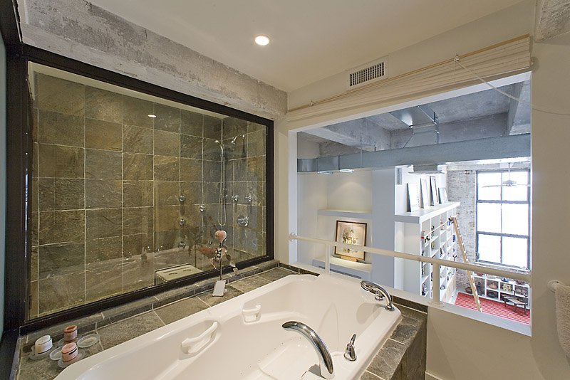 330 Wythe Avenue, Unit 4J Brooklyn, NY 11249 - Photo 5 of 6 a bathroom with a bathtub and a shower