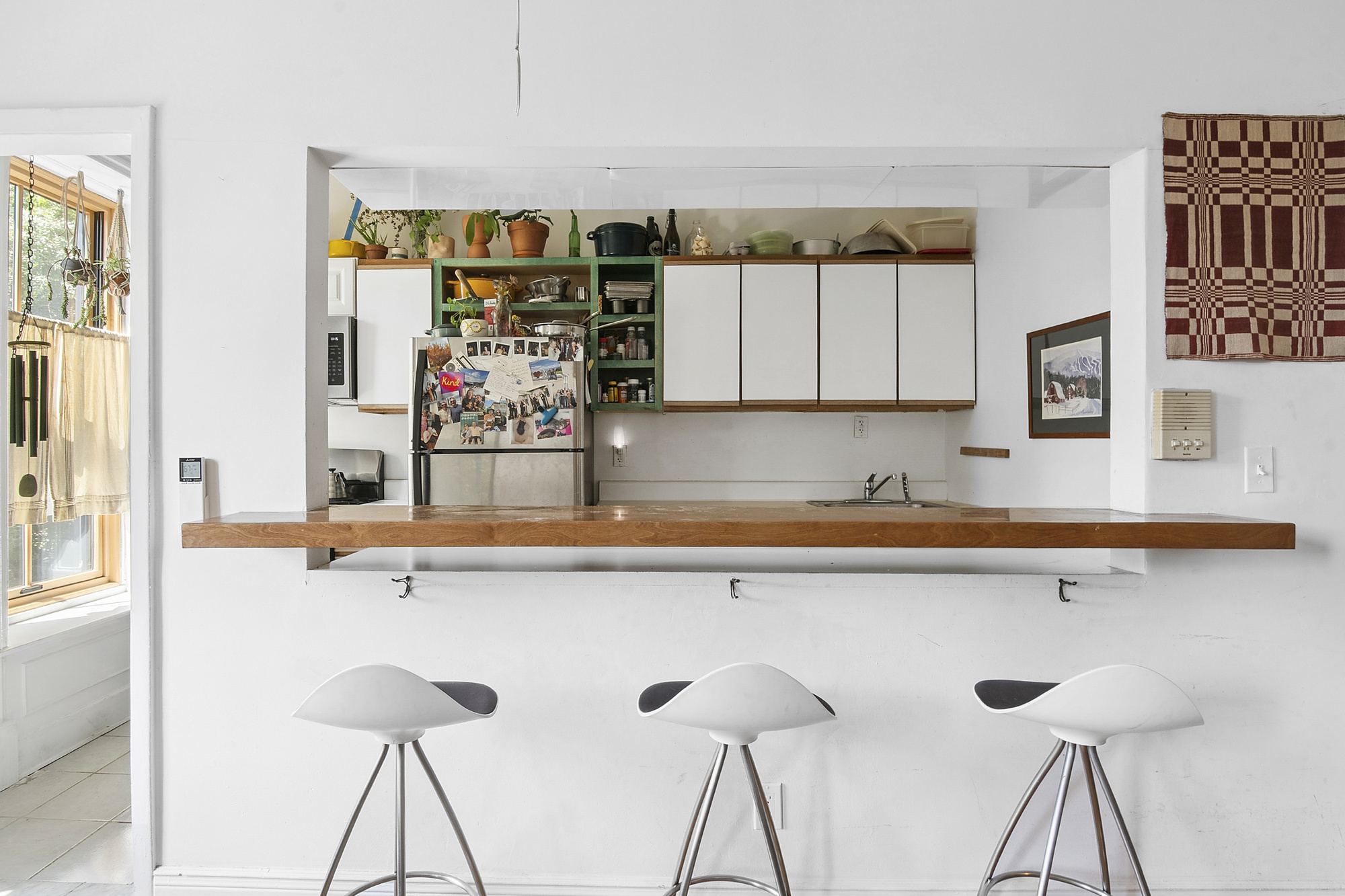 789 A Monroe Street, Unit 2 Brooklyn, NY 11221 - Photo 2 of 8 a view of a kitchen with stainless steel appliances granite countertop a sink and a refrigerator