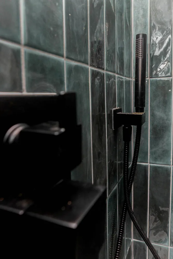 a white bath tub sitting in a bathroom