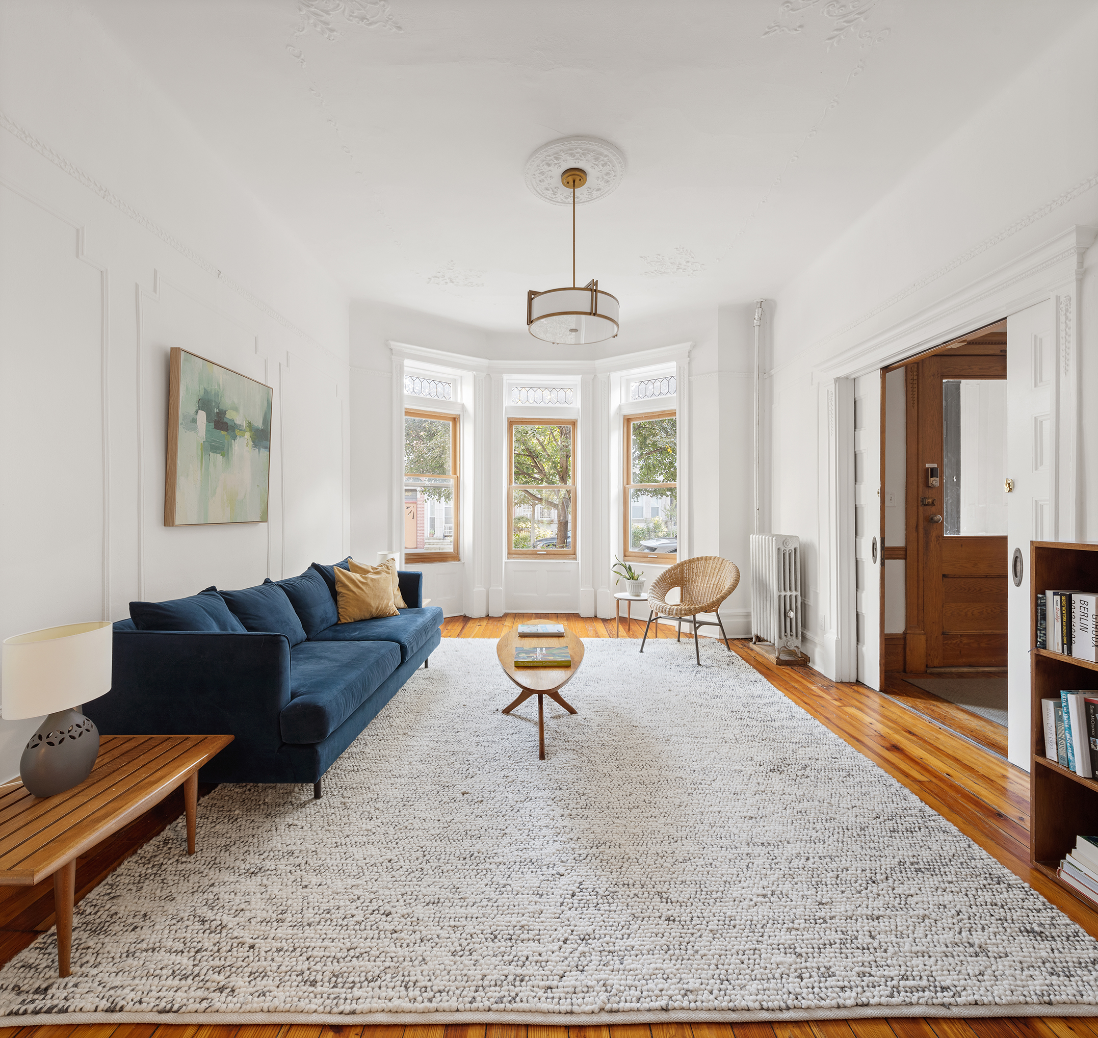 195 Lefferts Avenue Brooklyn, NY 11225 - Photo 2 of 18 a living room with furniture and wooden floor