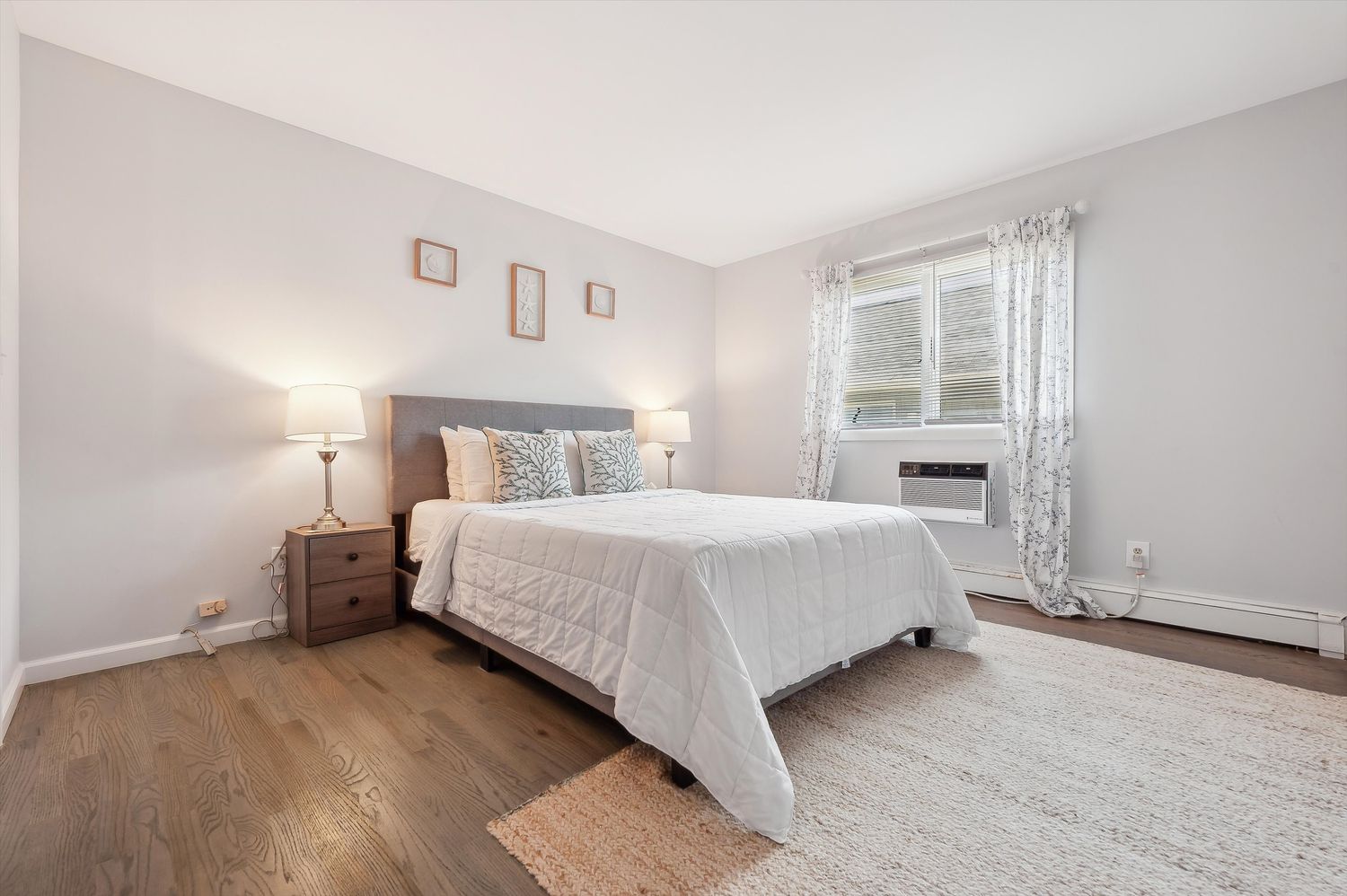 a bathroom with a sink toilet a mirror and shower