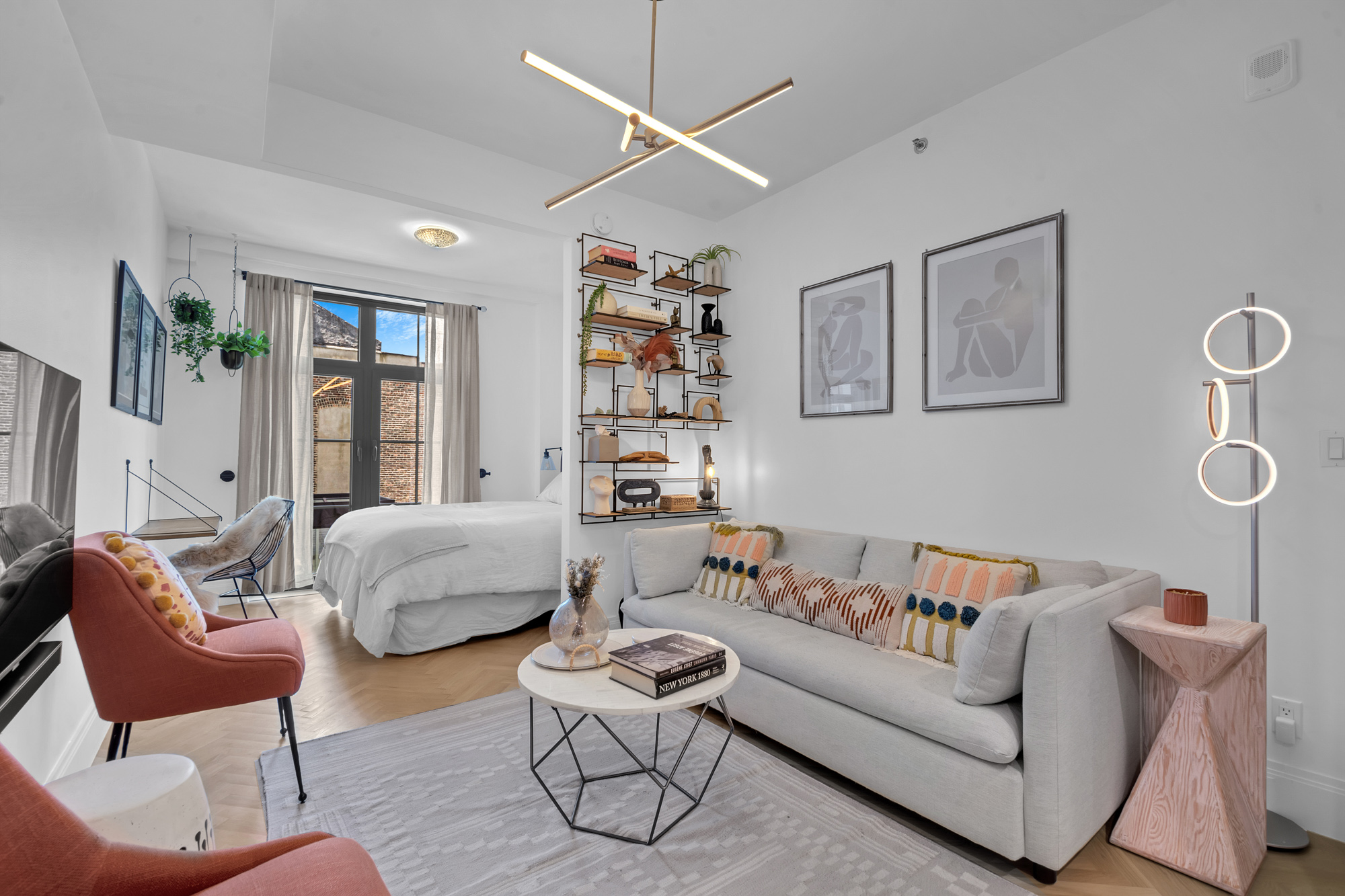 300 West 122nd Street, Unit 6R Manhattan, NY 10027 - Photo 2 of 23 a living room with furniture and a large window