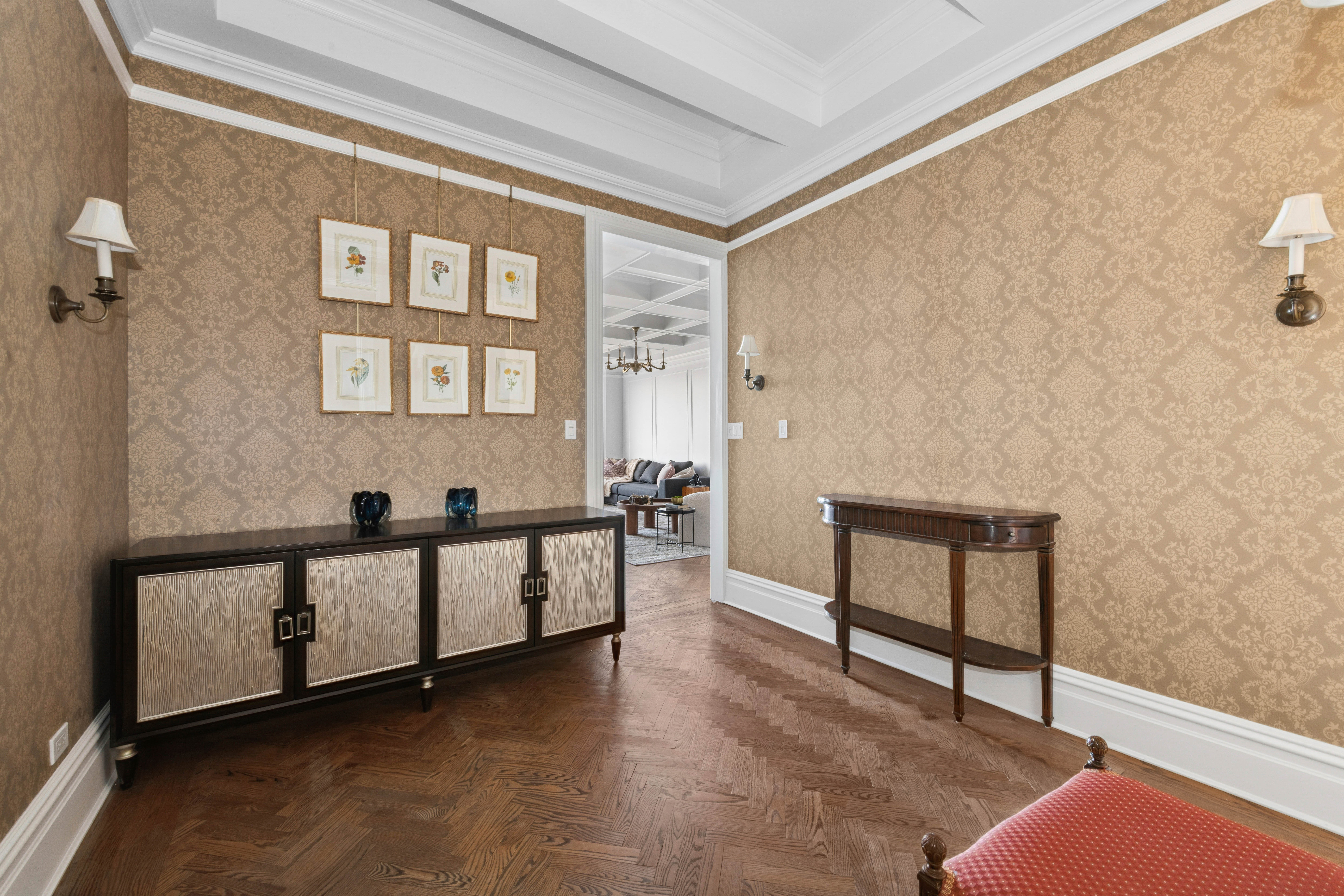 1140 5th Avenue, Unit 14B Manhattan, NY 10128 - Photo 15 of 18 a living room with furniture and a window