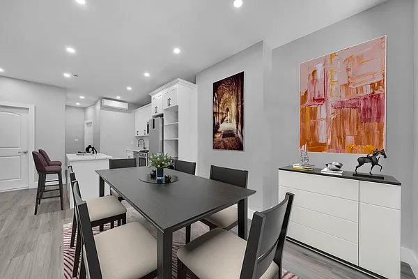30 Marconi Place, Unit 2 Brooklyn, NY 11233 - Photo 6 of 11 a view of a dining room with furniture and wooden floor